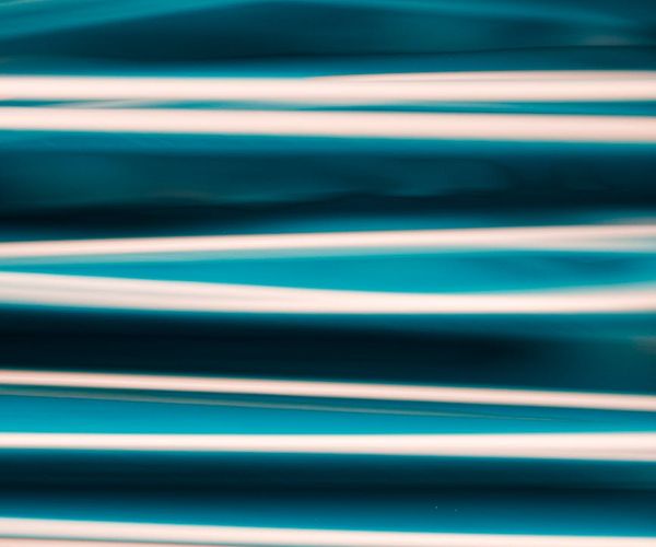 Flowing abstract lines representing vital energy